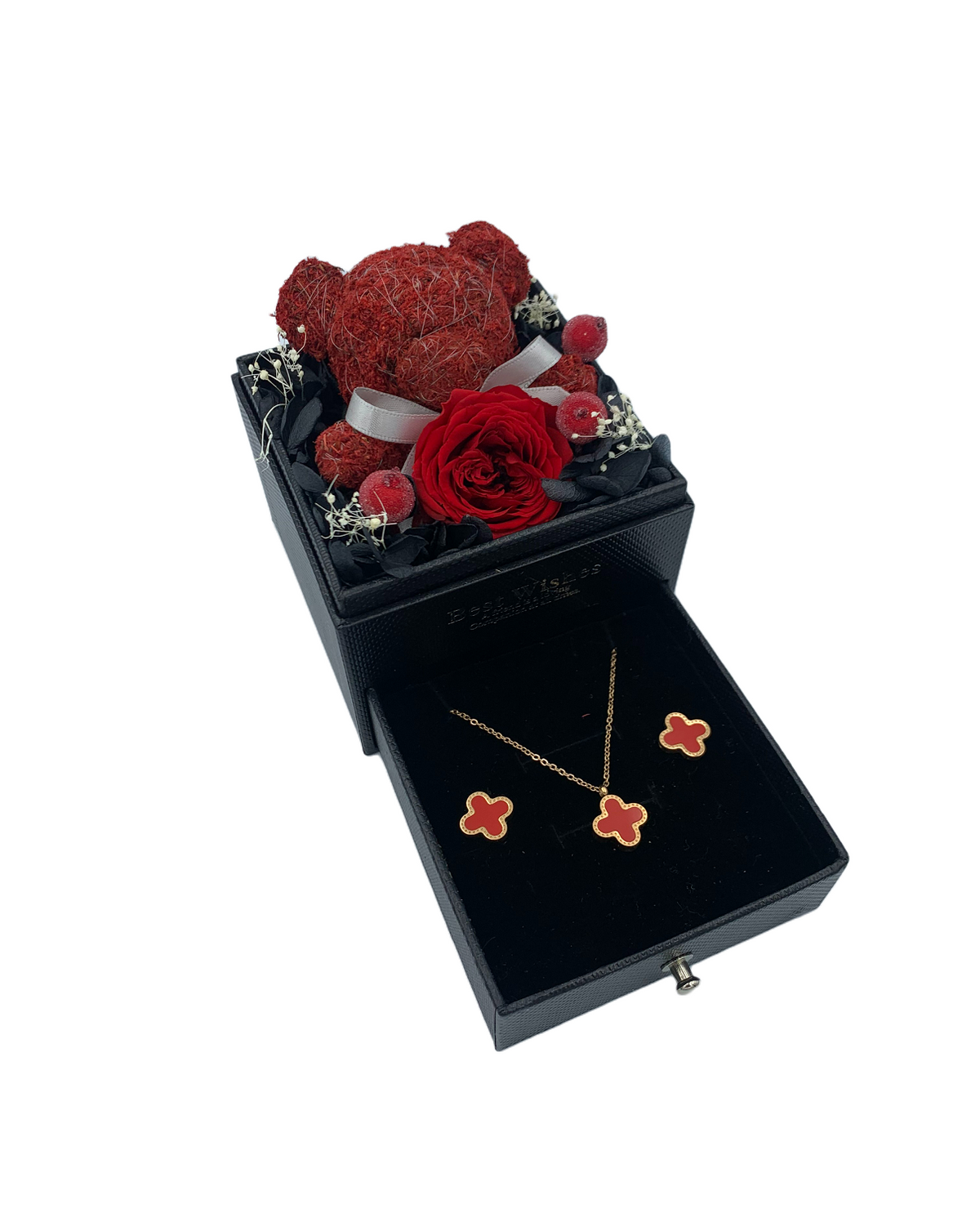 Plush teddy cradling a red preserved rose that lasts 3+ years