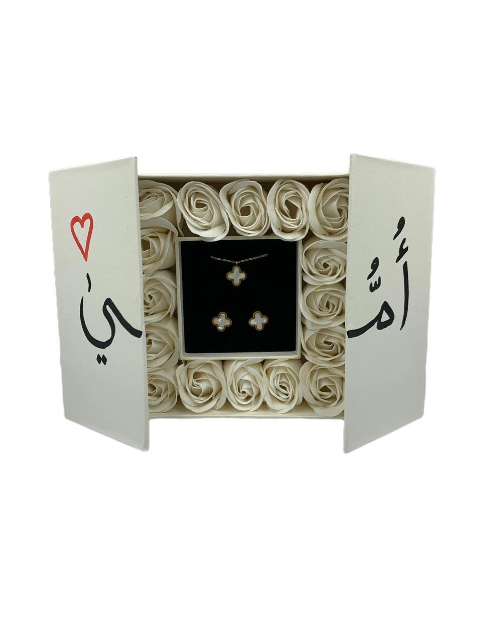 Sixteen White Roses: scented white preserved roses packed edge to edge in a white gift box