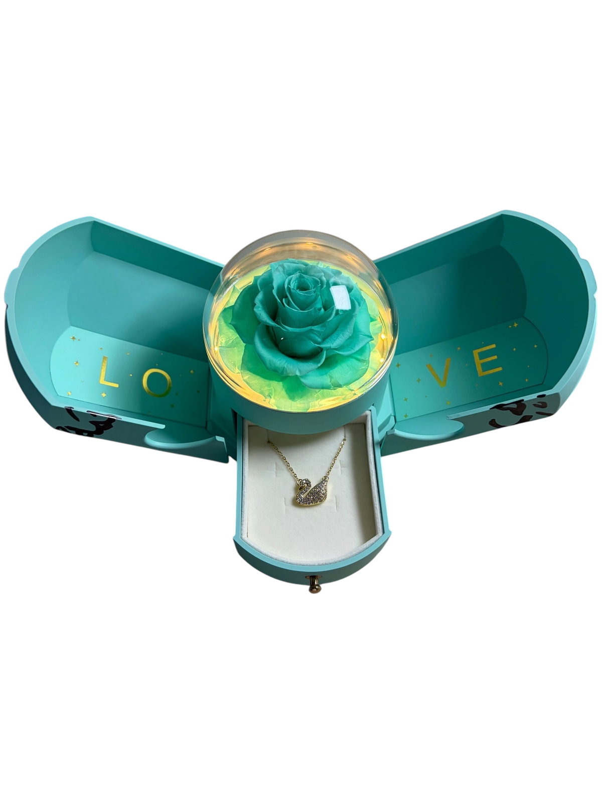 Turquoise Daydream: aqua fold-open gift box with a lit preserved rose and plated jewelry drawer