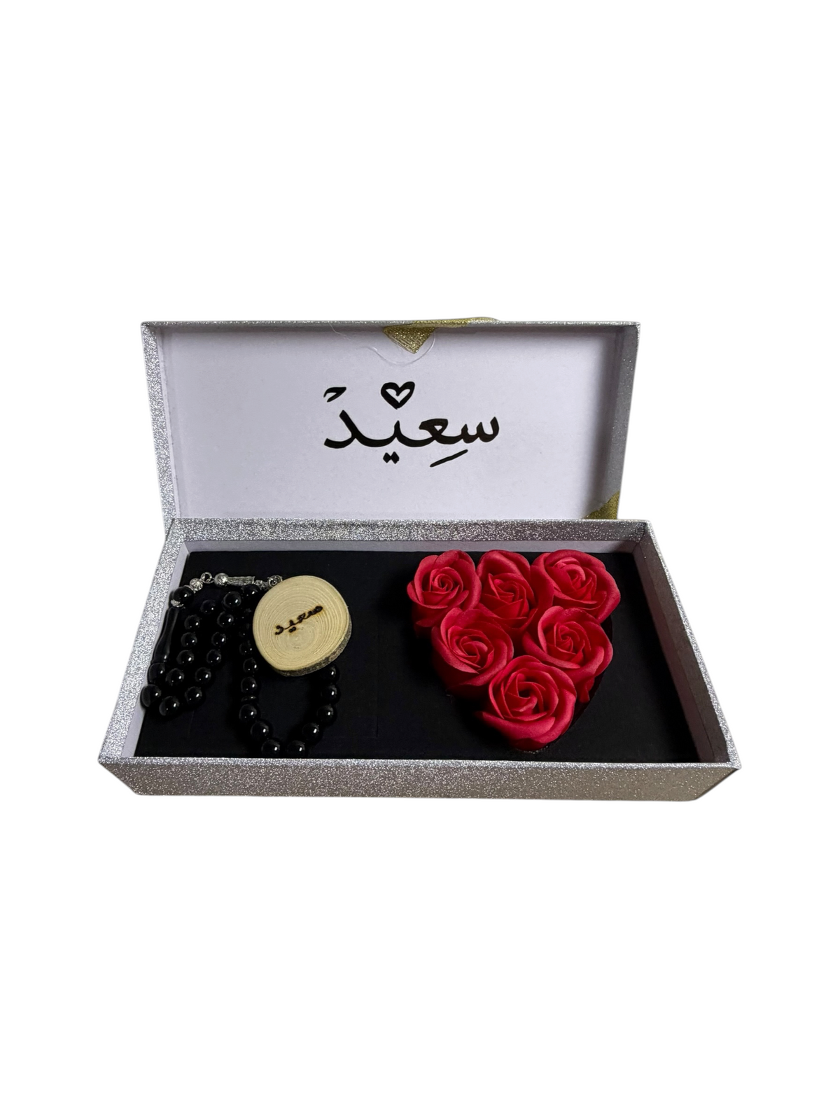 Masbaha & Roses: black masbaha with a name on its wooden tag and six red roses in a heart
