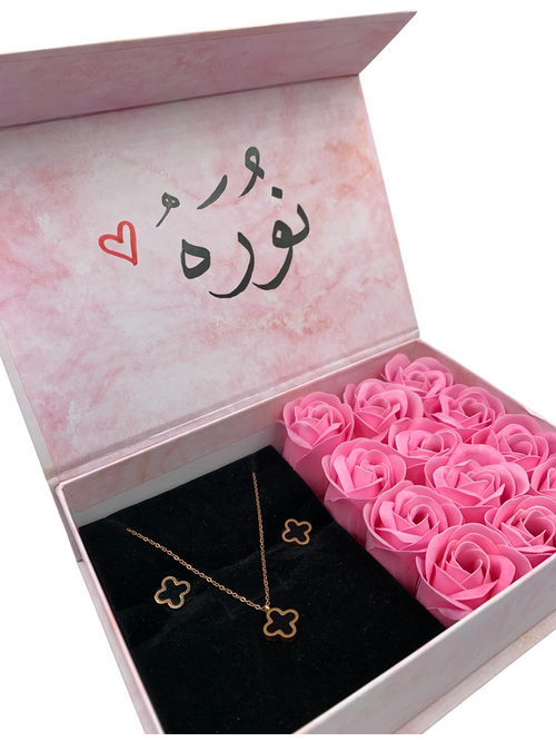 Twelve fragrant pink preserved roses in the blush 19 by 13 cm gift box